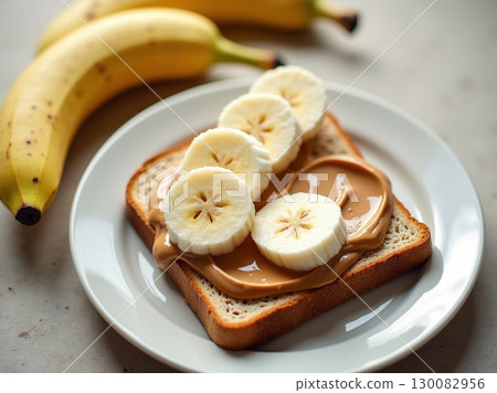 Healthy and Delicious Banana Peanut Butter Toast Breakfast or Snack Concept 130082956