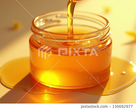 Creative Studio Pouring Fresh Natural Honey into Glass Jar Still Life Creative Studio Pouring Fresh Natural Honey into Glass Jar Still Life 130082977
