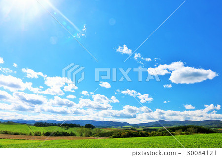 Hokkaido Autumn blue sky and Biei scenery 130084121