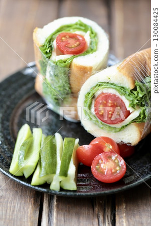 Healthy vegetable and cheese roll sandwich with homemade pickles 130084425