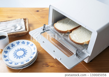 Baking bread with an oven toaster Baking bread with an oven toaster 130085056