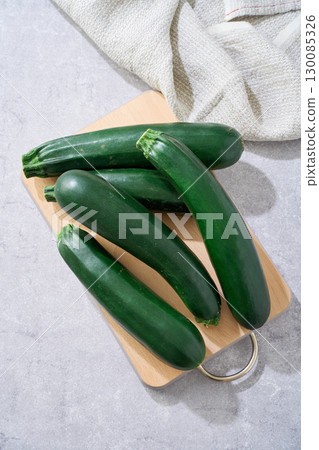 Zucchini | A green vegetable in season in summer Zucchini | A green vegetable in season in summer 130085326