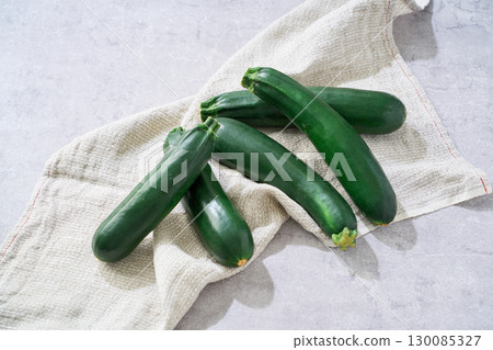 Zucchini | A green vegetable in season in summer Zucchini | A green vegetable in season in summer 130085327