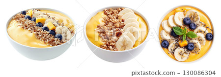 Set of banana acai smoothie bowls with chia seeds, walnuts and fresh berries, isolated on transparent background. 130086304