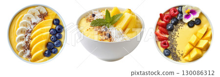 Set of pineapple and mango acai smoothie bowls with fresh berries, nuts and seeds topping isolated on transparent background. 130086312