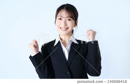 Image of a business woman doing a guts pose 130086418