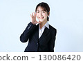 An image of a business woman cheering 130086420