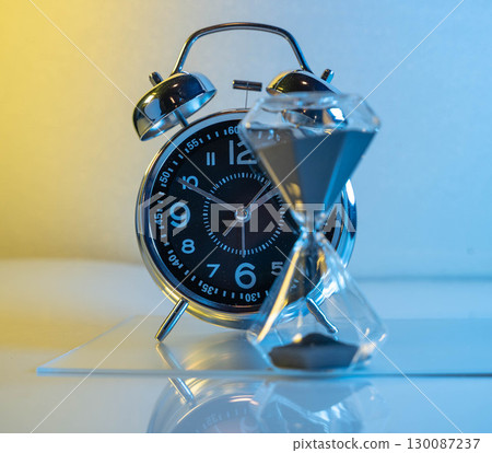 Alarm Clock and Hourglass Alarm Clock and Hourglass 130087237