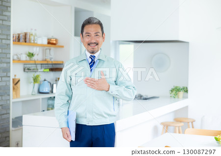 Housing sales portrait of a man wearing work clothes Housing sales portrait of a man wearing work clothes 130087297