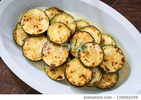 Grilled Marinated Zucchini | A summer side dish of marinated grilled zucchini 130088209