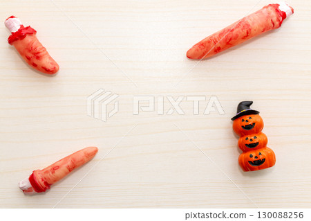 Flat Lay of Halloween Decorations and Bloody Fingers 130088256