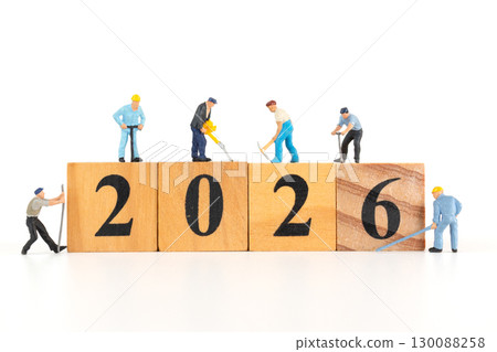 Miniature Workers Building 2026 on Wooden Blocks Miniature Workers Building 2026 on Wooden Blocks 130088258