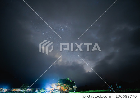 ecology travel night view with camping outdoor relax in rice field at chiangmai thailand in raining season ecology travel night view with camping outdoor relax in rice field at chiangmai thailand in raining season 130088770
