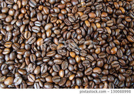 Surface with roasted coffee beans background. Top view. Surface with roasted coffee beans background. Top view. 130088998