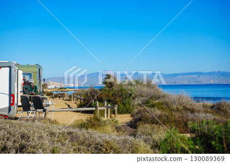 Camper car on beach, camping on nature Camper car on beach, camping on nature 130089369