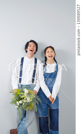 Couple photo of a man and woman wearing denim Couple photo of a man and woman wearing denim 130089527