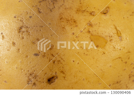 Macro surface texture of unpeeled fresh raw potatoes. Macro surface texture of unpeeled fresh raw potatoes. 130090406