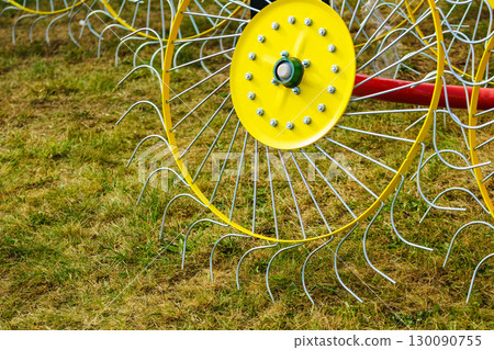 Tractor with rotary rake, agriculture machine 130090755