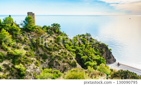 Spanish sea coast with tower, Andalusia 130090795