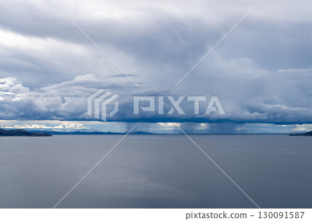 Panoramic view of Lake Titicaca from Taquile Island, Peru 130091587