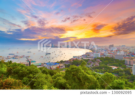 The building and skyscrapers in twilight time in Pattaya,Thailand. Pattaya city is famous about sea sport and night life entertainment. 130092095