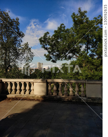 Panoramic view of prague from havlickovy sady park with balustrade in the foreground 130092635
