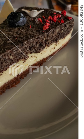 Delicious poppy seed cake with blueberry and raspberry topping in slovakia strbske pleso, high tatras 130092848