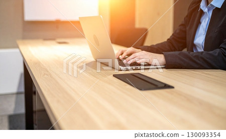 Businessman working on a laptop 130093354