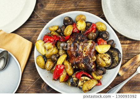 Appetizing baked pork with vegetables. Appetizing baked pork with vegetables. 130093392