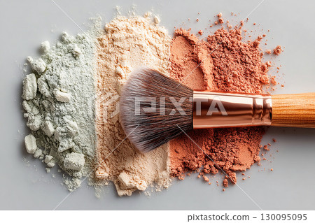 Beauty brand. Flat lay of makeup brush placed next to a color palette on white background. Beauty brand. Flat lay of makeup brush placed next to a color palette on white background. 130095095