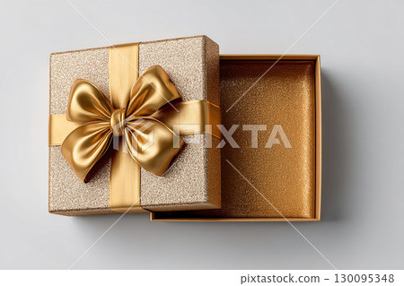 Present for celebration. Luxurious present. Opened elegant square box. Top view. Jewelry, birthdays and luxury branding. 130095348