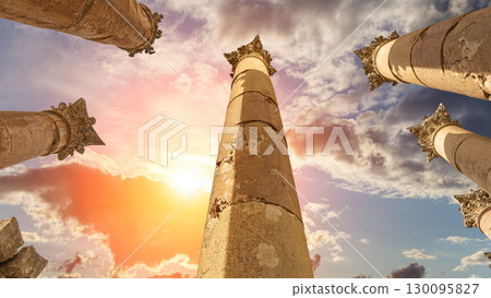 Roman Columns in the Jordanian city of Jerash (Gerasa of Antiquity), capital and largest city of Jerash Governorate, Jordan. Against the background of a beautiful sky with clouds 130095827