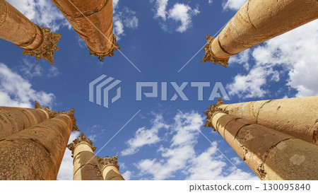 Roman Columns in the Jordanian city of Jerash (Gerasa of Antiquity), capital and largest city of Jerash Governorate, Jordan. Against the background of a beautiful sky with clouds Roman Columns in the Jordanian city of Jerash (Gerasa of Antiquity), capital and largest city of Jerash Governorate, Jordan. Against the background of a beautiful sky with clouds 130095840