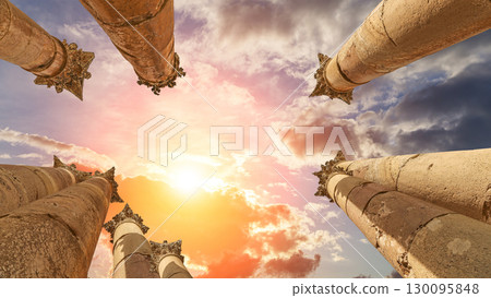 Roman Columns in the Jordanian city of Jerash (Gerasa of Antiquity), capital and largest city of Jerash Governorate, Jordan. Against the background of a beautiful sky with clouds Roman Columns in the Jordanian city of Jerash (Gerasa of Antiquity), capital and largest city of Jerash Governorate, Jordan. Against the background of a beautiful sky with clouds 130095848