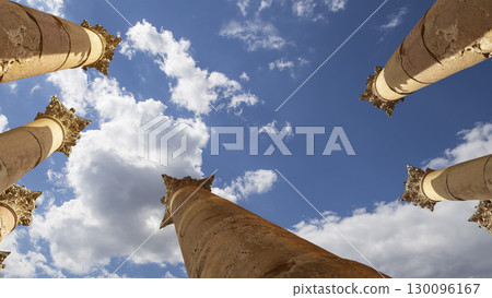 Roman Columns in the Jordanian city of Jerash (Gerasa of Antiquity), capital and largest city of Jerash Governorate, Jordan. Against the background of a beautiful sky with clouds 130096167