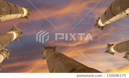 Roman Columns in the Jordanian city of Jerash (Gerasa of Antiquity), capital and largest city of Jerash Governorate, Jordan. Against the background of a beautiful sky with clouds 130096175