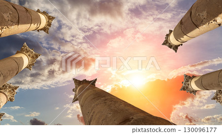 Roman Columns in the Jordanian city of Jerash (Gerasa of Antiquity), capital and largest city of Jerash Governorate, Jordan. Against the background of a beautiful sky with clouds Roman Columns in the Jordanian city of Jerash (Gerasa of Antiquity), capital and largest city of Jerash Governorate, Jordan. Against the background of a beautiful sky with clouds 130096177