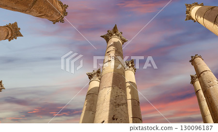 Roman Columns in the Jordanian city of Jerash (Gerasa of Antiquity), capital and largest city of Jerash Governorate, Jordan. Against the background of a beautiful sky with clouds 130096187