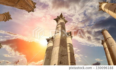 Roman Columns in the Jordanian city of Jerash (Gerasa of Antiquity), capital and largest city of Jerash Governorate, Jordan. Against the background of a beautiful sky with clouds 130096188