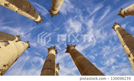 Roman Columns in the Jordanian city of Jerash (Gerasa of Antiquity), capital and largest city of Jerash Governorate, Jordan. Against the background of a beautiful sky with clouds Roman Columns in the Jordanian city of Jerash (Gerasa of Antiquity), capital and largest city of Jerash Governorate, Jordan. Against the background of a beautiful sky with clouds 130096239