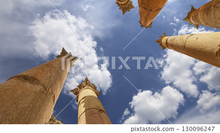 Roman Columns in the Jordanian city of Jerash (Gerasa of Antiquity), capital and largest city of Jerash Governorate, Jordan. Against the background of a beautiful sky with clouds Roman Columns in the Jordanian city of Jerash (Gerasa of Antiquity), capital and largest city of Jerash Governorate, Jordan. Against the background of a beautiful sky with clouds 130096247