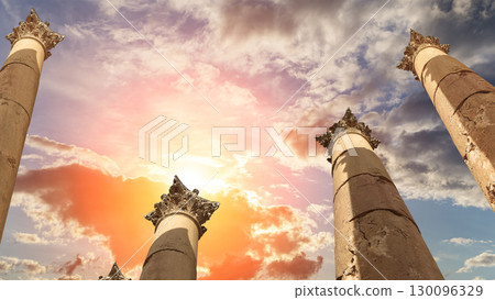 Roman Columns in the Jordanian city of Jerash (Gerasa of Antiquity), capital and largest city of Jerash Governorate, Jordan. Against the background of a beautiful sky with clouds 130096329