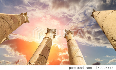Roman Columns in the Jordanian city of Jerash (Gerasa of Antiquity), capital and largest city of Jerash Governorate, Jordan. Against the background of a beautiful sky with clouds Roman Columns in the Jordanian city of Jerash (Gerasa of Antiquity), capital and largest city of Jerash Governorate, Jordan. Against the background of a beautiful sky with clouds 130096352