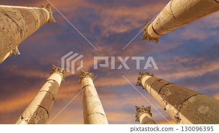 Roman Columns in the Jordanian city of Jerash (Gerasa of Antiquity), capital and largest city of Jerash Governorate, Jordan. Against the background of a beautiful sky with clouds Roman Columns in the Jordanian city of Jerash (Gerasa of Antiquity), capital and largest city of Jerash Governorate, Jordan. Against the background of a beautiful sky with clouds 130096395
