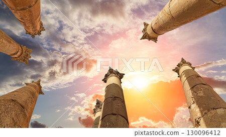 Roman Columns in the Jordanian city of Jerash (Gerasa of Antiquity), capital and largest city of Jerash Governorate, Jordan. Against the background of a beautiful sky with clouds Roman Columns in the Jordanian city of Jerash (Gerasa of Antiquity), capital and largest city of Jerash Governorate, Jordan. Against the background of a beautiful sky with clouds 130096412