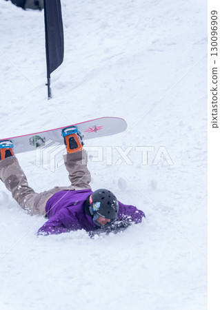 Snowboarder Falling in the Snow Snowboarder Falling in the Snow 130096909