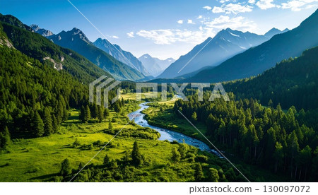 A natural landscape of blue mountains and green valleys 130097072