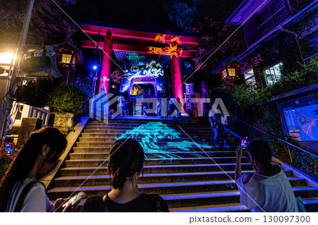 Fujisawa cityscape in Japan, with a view of the illuminated Enoshima Shrine and Japan's three great Benzaiten shrines Fujisawa cityscape in Japan, with a view of the illuminated Enoshima Shrine and Japan's three great Benzaiten shrines 130097300