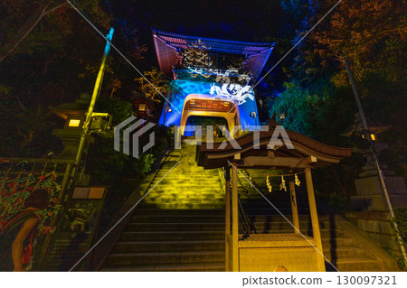 Fujisawa cityscape in Japan, with a view of the illuminated Enoshima Shrine and Japan's three great Benzaiten shrines Fujisawa cityscape in Japan, with a view of the illuminated Enoshima Shrine and Japan's three great Benzaiten shrines 130097321