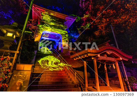 Fujisawa cityscape in Japan, with a view of the illuminated Enoshima Shrine and Japan's three great Benzaiten shrines 130097369